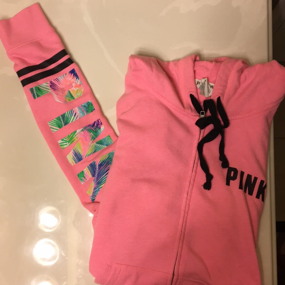 Pink zipper hoodie with PINK written on sleeve
